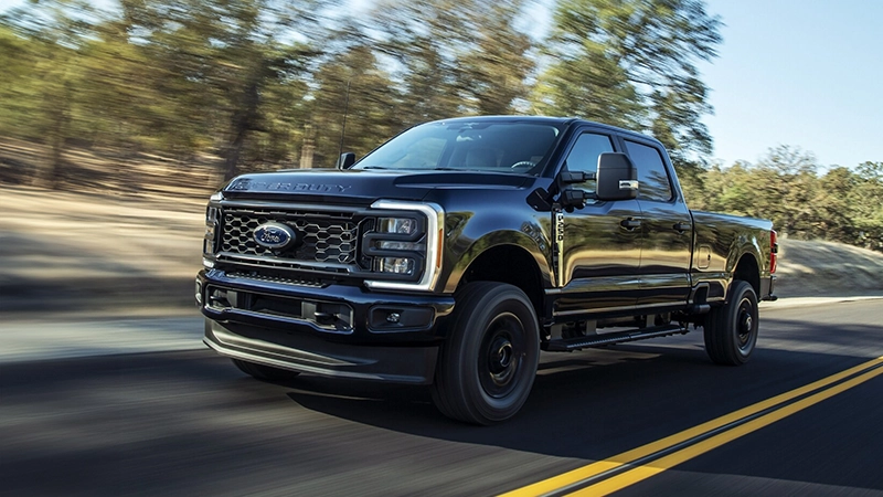 Ford F250 3/4 angle parked neear mountain and right hand drive by Autogroup international