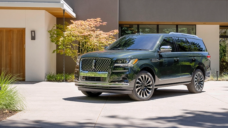 Lincoln Navigator parked in driveway converted to right hand drive Autogroup International