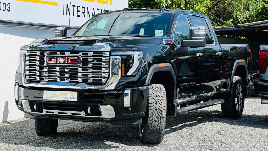 Black GMC Denali HD pickup truck outdoors