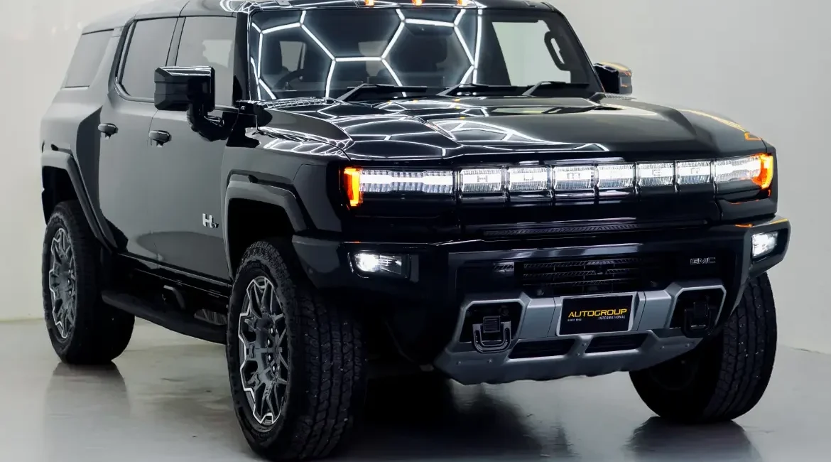 Black electric SUV in studio lighting